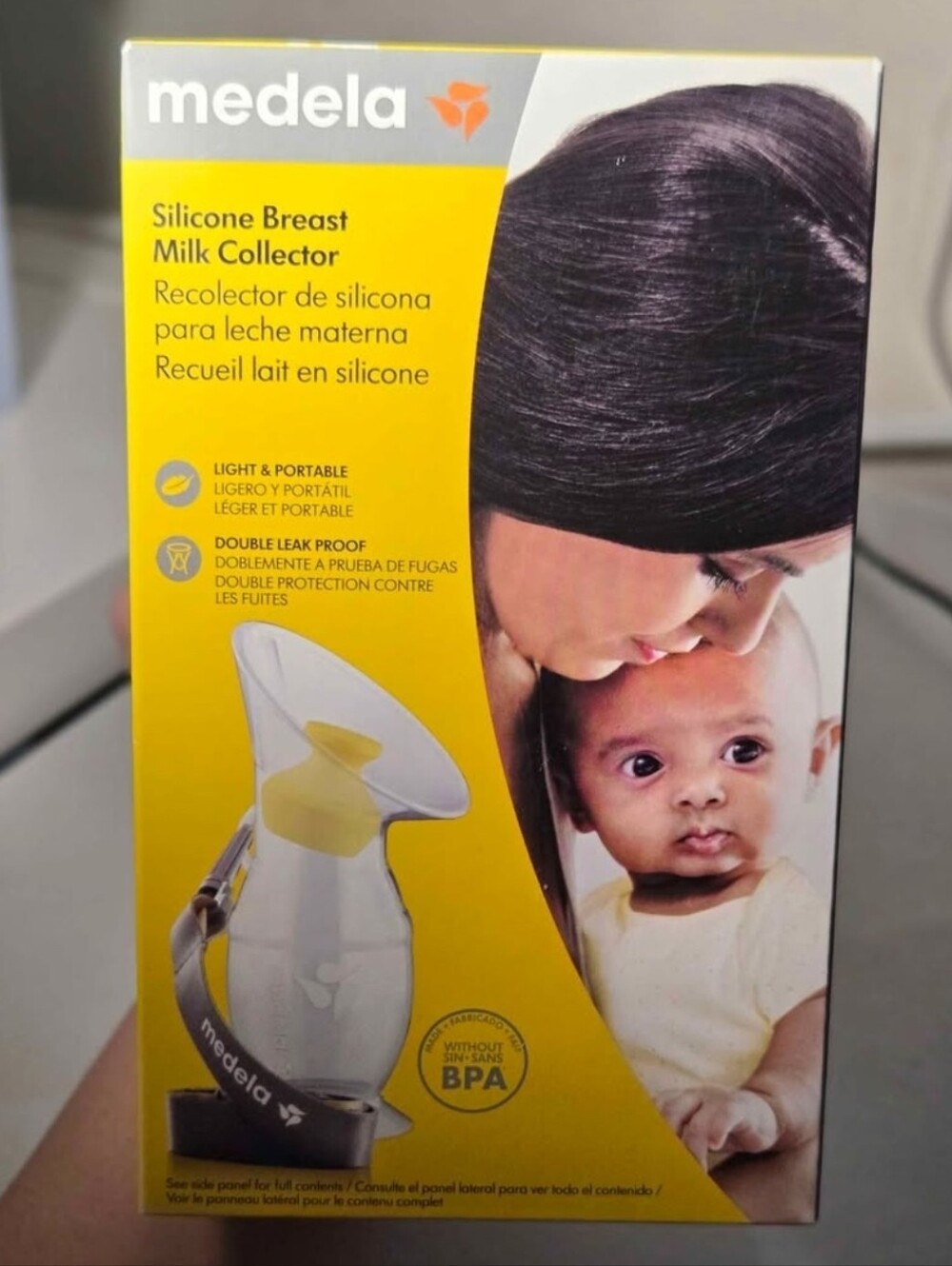 Medela Silicone Breast Milk Collector in Yellow and White